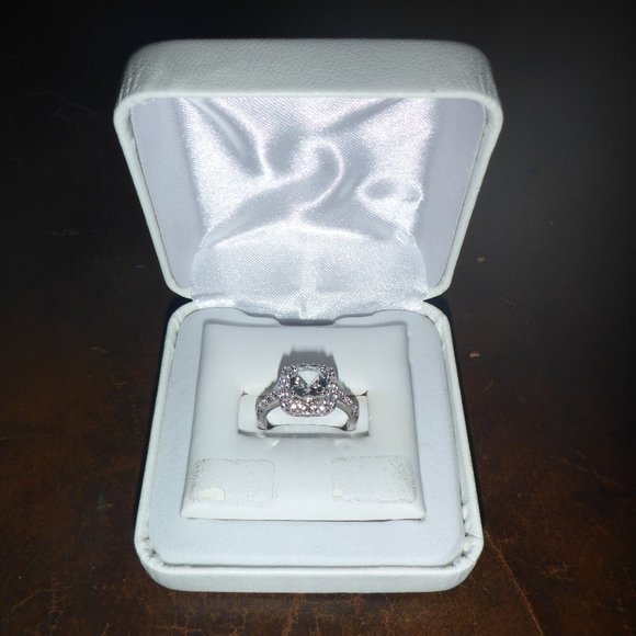 Woman's Sterling Silver Ring w/ White Sapphires